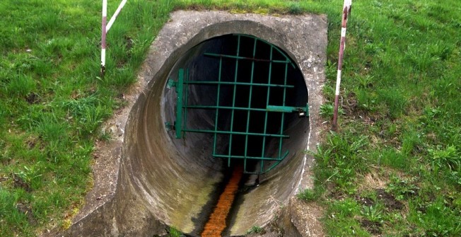 Cost of Emptying a Tank 